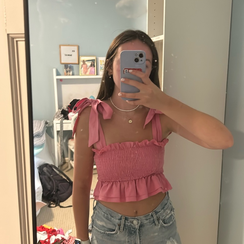 Pink tank top with adjustable straps